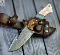 The Hunter's Edge: 8.25-Inch Gut Hook Skinning Hunting Knife with Raindrops Damascus Steel Blade, Rosewood and Epoxy Resin Handle ZB Knives Store