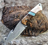 The Hunter's Edge: 8.25-Inch Gut Hook Skinning Hunting Knife with Raindrops Damascus Steel Blade, Rosewood and Epoxy Resin Handle ZB Knives Store