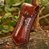 Unlock the power of Damascus steel with this stunning switch blade pocket knife